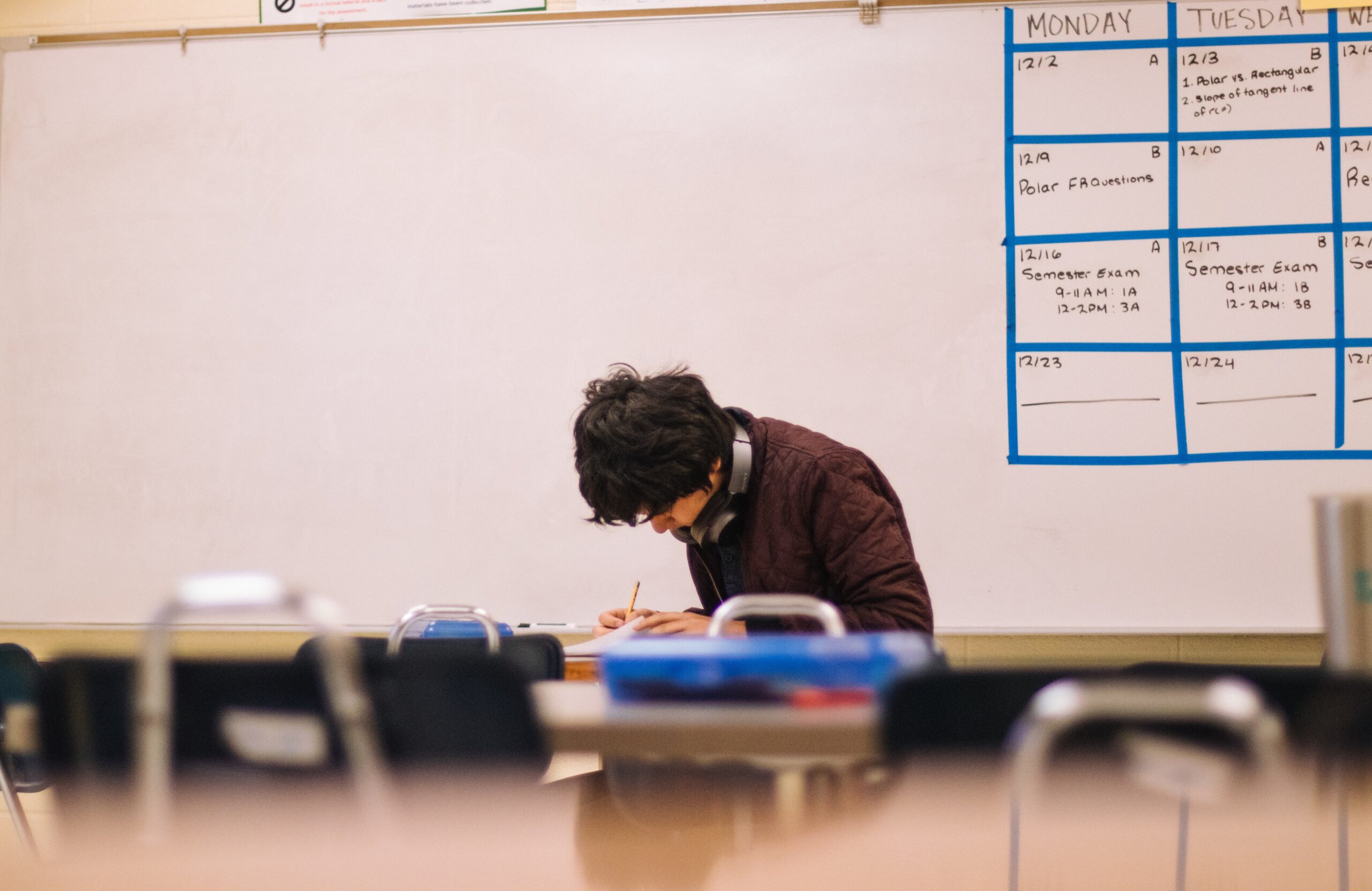 Photo by Jeswin Thomas: https://www.pexels.com/photo/man-writing-on-table-3380743/